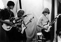 Grupė "Reurgs Ribs" (vėliau "Dobilas") su savadarbėmis gitaromis 16-oje vidurinėje mokykloje, Naujametinis karnavalas, 1966–1967 m.: N. Ramanauskas, S. Gaidulis, E. Urbonas (iš asmeninio E. Urbono archyvo)