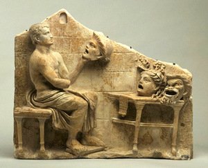  Menander at his studio with the New comedy masks, 1st century BC - 1 Century AD. Princeton University Art Museum, United States.