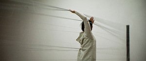 Židrija Janušaitė. Performance "Solitudes. Touches", 90 min, 2015, gallery Meno parkas. Along with Rosanda Sorakaitė and Laurynas Leonaitis.